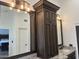 Double vanity bathroom with granite countertops and dark wood cabinets at 5812 E Grandview Rd, Scottsdale, AZ 85254