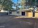 Large backyard with covered patio and side yard at 6931 W Crittenden Ln, Phoenix, AZ 85033