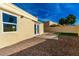 Backyard featuring gravel, artificial turf, and a walkway at 7006 E Jensen St # 111, Mesa, AZ 85207