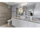 Modern bathroom with a floating vanity and large walk-in shower at 7180 E Kierland Blvd # 311, Scottsdale, AZ 85254