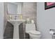 Stylish powder room with pedestal sink and modern fixtures at 7180 E Kierland Blvd # 311, Scottsdale, AZ 85254