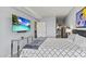 Spacious bedroom with a large bed, TV, and ensuite bathroom access at 7180 E Kierland Blvd # 311, Scottsdale, AZ 85254