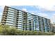 Modern high rise building with lush landscaping at 7180 E Kierland Blvd # 311, Scottsdale, AZ 85254