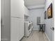 Convenient laundry room with washer, dryer, and cabinets at 7180 E Kierland Blvd # 311, Scottsdale, AZ 85254