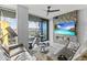 Modern living room features a fireplace, large TV, and comfortable seating at 7180 E Kierland Blvd # 311, Scottsdale, AZ 85254