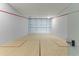 Indoor squash court with hardwood floor at 7180 E Kierland Blvd # 311, Scottsdale, AZ 85254