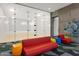 Modern squash court with glass walls and seating area at 7180 E Kierland Blvd # 311, Scottsdale, AZ 85254