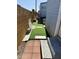 Artificial turf and patio area in the backyard at 7750 E Broadway Rd # 911, Mesa, AZ 85208