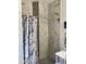 Modern bathroom with marble shower and grey accents at 7750 E Broadway Rd # 911, Mesa, AZ 85208