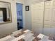 Bright bedroom with mirrored closet doors and ensuite access at 7750 E Broadway Rd # 911, Mesa, AZ 85208