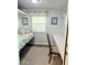 Cozy bedroom with a double bed and built-in desk at 7750 E Broadway Rd # 911, Mesa, AZ 85208