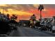 Residential street at sunset with palm trees at 7750 E Broadway Rd # 911, Mesa, AZ 85208