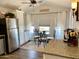 Kitchen dining area with a round glass table and three chairs at 7750 E Broadway Rd # 911, Mesa, AZ 85208