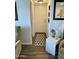 Clean entryway with a geometric patterned rug at 7750 E Broadway Rd # 911, Mesa, AZ 85208