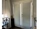 White french doors with built-in blinds, leading to patio at 7750 E Broadway Rd # 911, Mesa, AZ 85208
