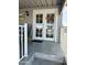 Front entry with double doors and a welcoming decor at 7750 E Broadway Rd # 911, Mesa, AZ 85208