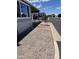 Landscaped front yard with gravel and small dog at 7750 E Broadway Rd # 911, Mesa, AZ 85208