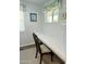 Bright home office with built-in desk and window seat at 7750 E Broadway Rd # 911, Mesa, AZ 85208