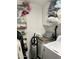 Functional laundry room with ample storage and shelving at 7750 E Broadway Rd # 911, Mesa, AZ 85208