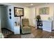 Relaxing living room with a recliner and a small desk area at 7750 E Broadway Rd # 911, Mesa, AZ 85208