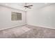 Bright bedroom with ceiling fan and window at 850 E Knox Rd, Tempe, AZ 85284