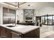 Modern kitchen with stainless steel appliances and expansive island at 9277 E Happy Hollow Dr, Scottsdale, AZ 85262