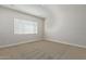 Simple bedroom with neutral walls and carpeting at 04 N Brenner Pass Rd, Queen Creek, AZ 85144