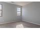 Bright bedroom with neutral walls and carpet flooring at 1083 W Kachina Dr, Coolidge, AZ 85128