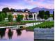 Community entrance with water feature and mountains in the background at 11300 N Casa Dega Dr # 1017, Surprise, AZ 85388