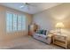 Bedroom with window seat and built-in wooden cabinet at 11917 E Mariposa Grande Dr, Scottsdale, AZ 85255