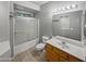 Bathroom with tiled floors, vanity, and shower/tub combo at 1351 N Pleasant Dr # 2079, Chandler, AZ 85225