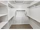 Spacious walk-in closet with built-in shelving and plenty of hanging space at 1351 N Pleasant Dr # 2079, Chandler, AZ 85225