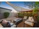 Cozy patio with fire pit and seating area, perfect for outdoor entertaining at 1611 E Baker Dr, Tempe, AZ 85282