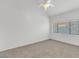 Spacious bedroom with vaulted ceiling and window coverings at 2040 S Longmore -- # 68, Mesa, AZ 85202