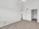 Large bedroom with ceiling fan and access to hallway at 2040 S Longmore -- # 68, Mesa, AZ 85202