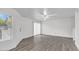 Bright living room with gray vinyl flooring and sliding door at 2040 S Longmore -- # 68, Mesa, AZ 85202
