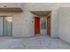 Red side entrance with a small patio area at 2040 S Longmore -- # 68, Mesa, AZ 85202