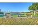 Well-maintained bocce ball court with benches and landscaping at 2101 S Meridian Rd # 421, Apache Junction, AZ 85120