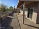 Covered patio features a brick-paver surface and backyard access at 2101 S Meridian Rd # 421, Apache Junction, AZ 85120