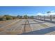 Enjoy community shuffleboard courts with ample space and seating at 2101 S Meridian Rd # 421, Apache Junction, AZ 85120