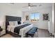 Main bedroom with a king-size bed, and stylish decor at 2119 E Jennifer Lynn Way, Phoenix, AZ 85022