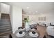 Modern dining room with round table and four chairs near stairs at 2121 E Voltaire Ave, Phoenix, AZ 85022