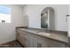 Modern bathroom with double vanity and walk-in shower at 2129 E Voltaire Ave, Phoenix, AZ 85032