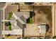 An aerial view of a single-story home with a fenced yard and outbuilding at 21406 E Mewes N Rd, Queen Creek, AZ 85142