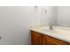 Half bathroom with a simple vanity, mirror, and light fixture at 21406 E Mewes N Rd, Queen Creek, AZ 85142