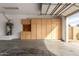 Garage interior with built-in storage cabinets at 21406 E Mewes N Rd, Queen Creek, AZ 85142