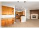 Spacious kitchen with ample wood cabinetry, stainless steel appliances, and an open layout at 21406 E Mewes N Rd, Queen Creek, AZ 85142