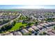 Aerial perspective of a residential area with houses, roads, and a central park at 2191 E Bellerive Pl, Chandler, AZ 85249