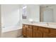 Primary bathroom with double vanity and soaking tub at 2316 S 66Th Ln, Phoenix, AZ 85043