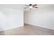 Bright bedroom with tile floors and ceiling fan at 2316 S 66Th Ln, Phoenix, AZ 85043